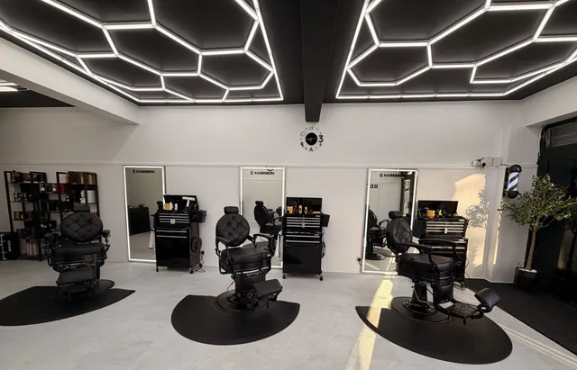 The chairs and mirrors at 11:11 Barbers